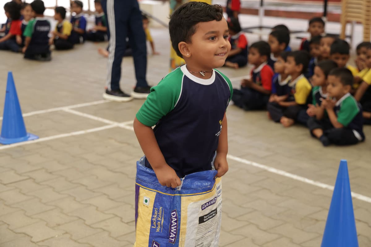 Teacher Helping Child